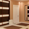 Плъзгащ се гардероб в коридора: вградени модели, модерен дизайн, характеристики на използването н...